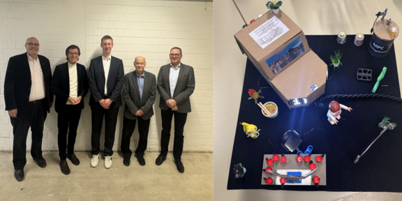 Herr Waldner mit seinen Prüfern und Doktorhut