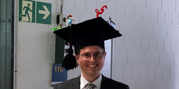Herr Homan mit Doktorhut